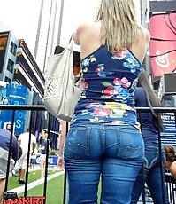 Women in skin tight jeans under sun